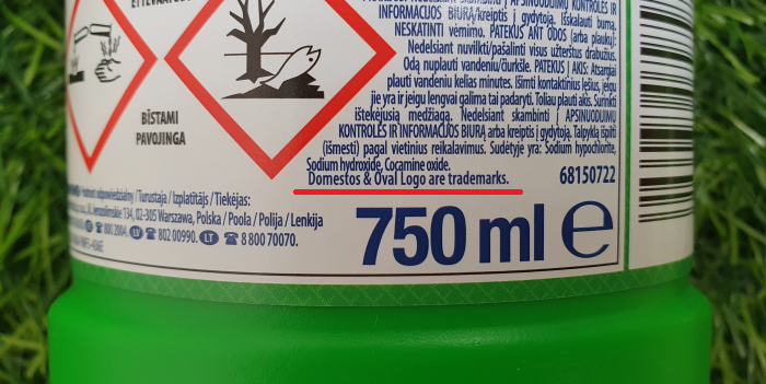 Znaczek R w kółku na etykiecie Domestos